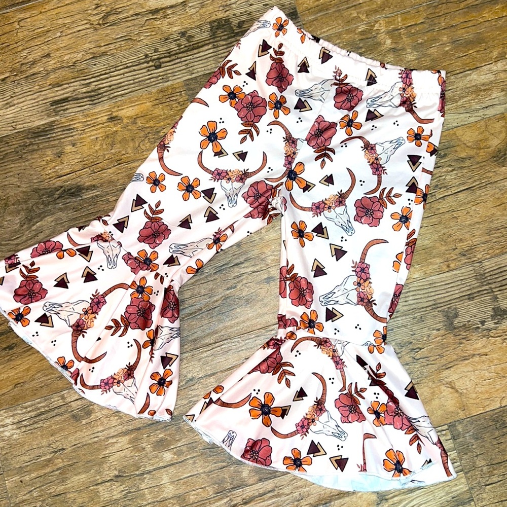 Childrens size bell bottoms with bull head print